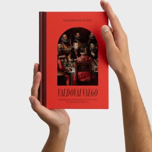Rankos laiko raudoną Neringos Dambrauskaitės-Martinkėnės knygą „Valdovai valgo“